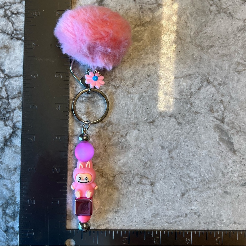 Pink Silicone Labubu Keychain with Pom Pom and Floral Accent - Picture 2 of 8